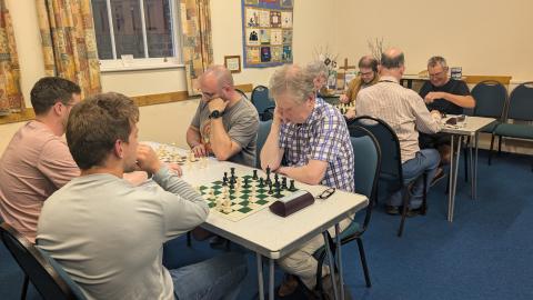 Chess players playing exchange chess